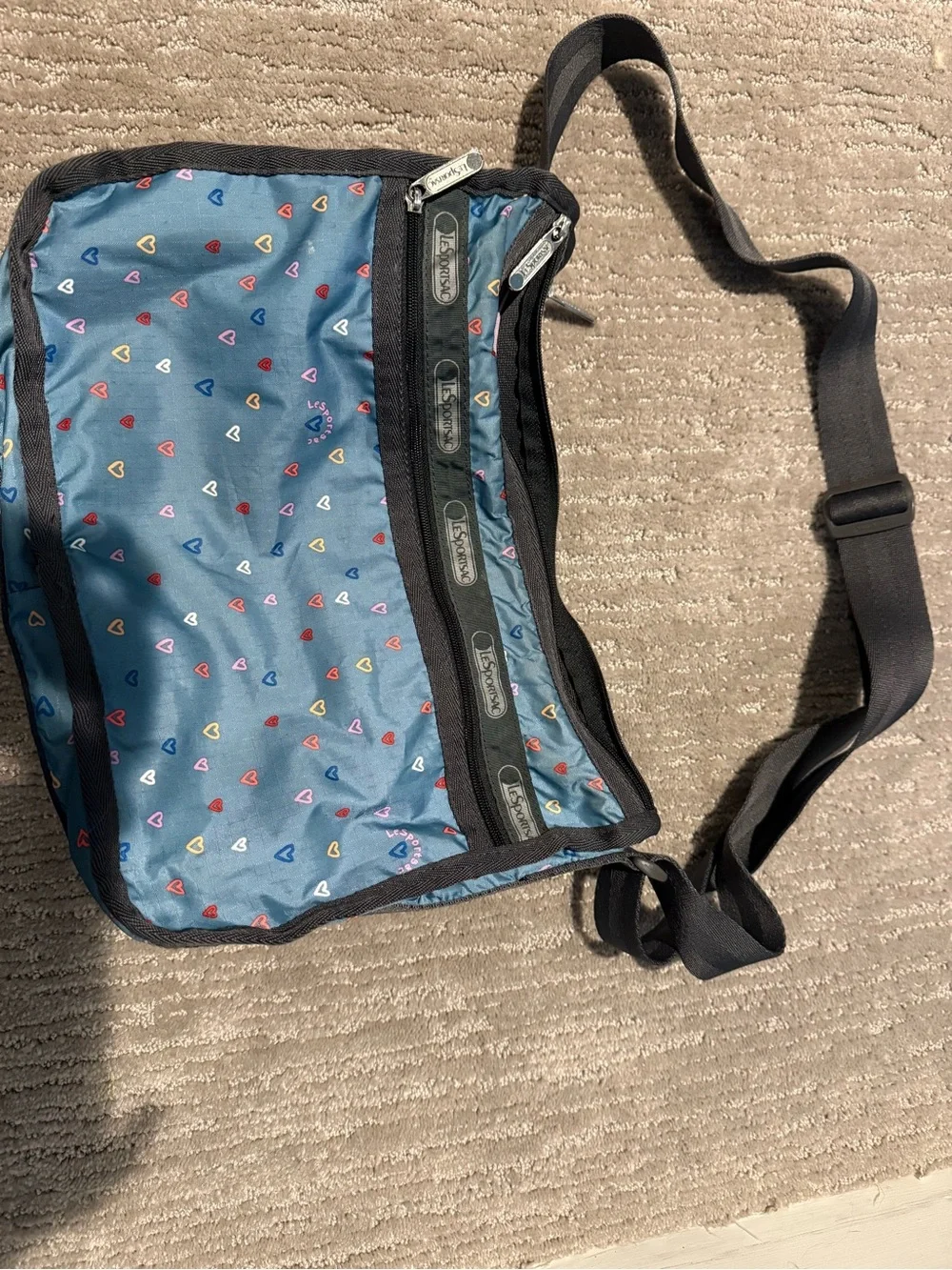 Lesportsac Teal w hearts cross body bag